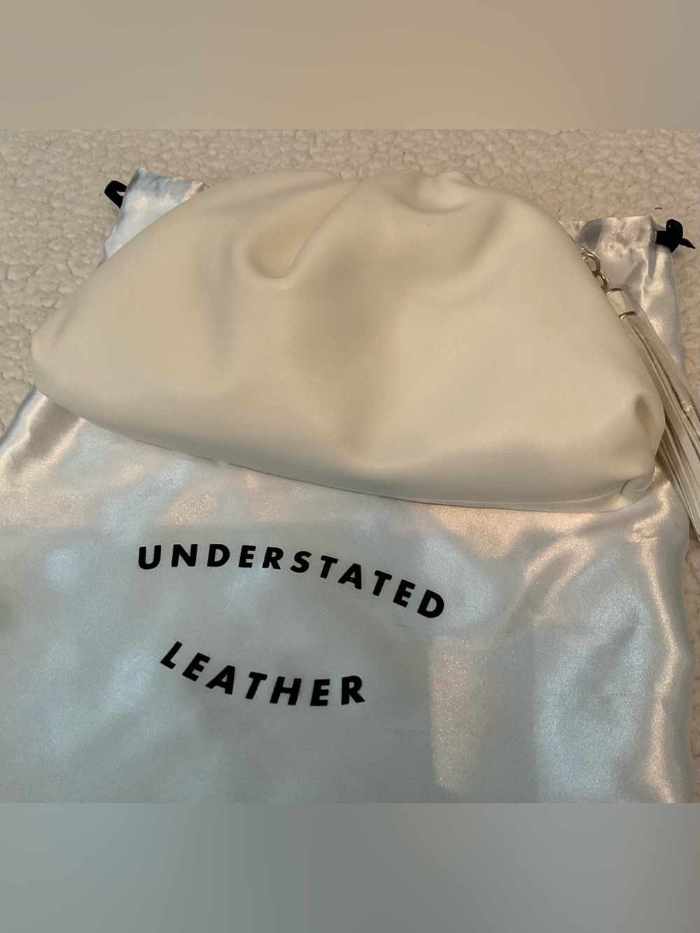 Understated Leather Crescent Clutch